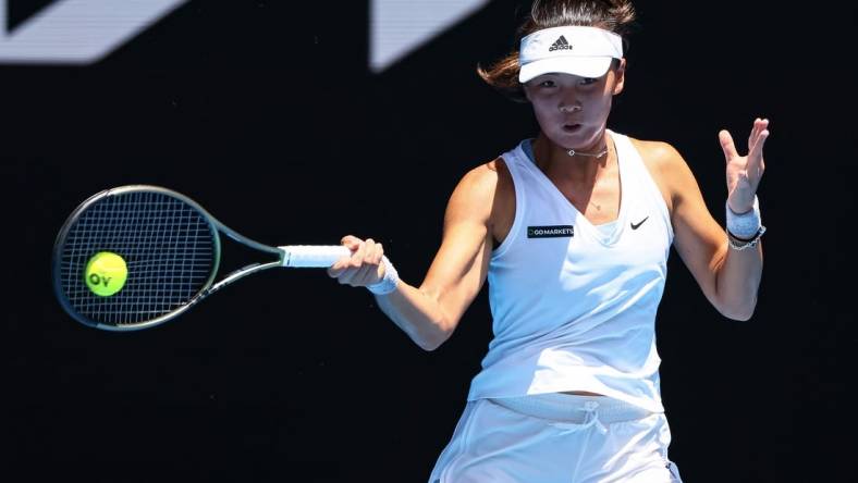 Jan 16, 2023; Melbourne, VICTORIA, Australia; Yue Yuan (China) returns the ball against Maria Sakkari (Greece) (not pictured) at Melbourne Park. Mandatory Credit: Mike Frey-USA TODAY Sports