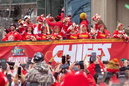 Kansas City Chiefs cheerleaders lead the Super Bowl LVII parade through downtown Kansas City, Missouri.