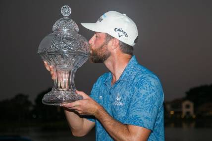 After winning the Honda Classic in a playoff round, Chris Kirk poses for a portrait with the Honda Classic trophy during the final round of the Honda Classic at PGA National Resort & Spa on Sunday, February 26, 2023, in Palm Beach Gardens, FL.