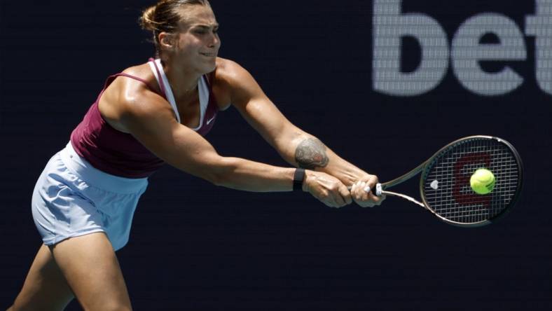 Mar 29, 2023; Miami, Florida, US; Aryna Sabalenka hits a backhand against Sorana Cirstea (ROU) (not pictured) in a women's singles quarterfinal on day ten of the Miami Open at Hard Rock Stadium. Mandatory Credit: Geoff Burke-USA TODAY Sports