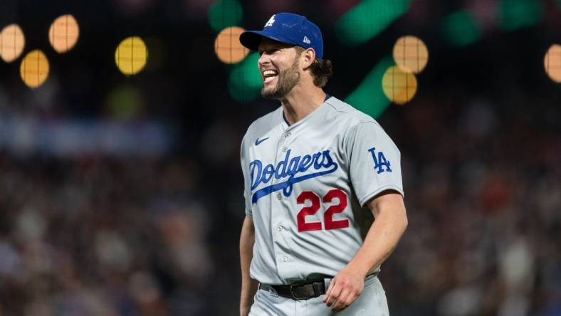 Apr 12, 2023; San Francisco, California, USA;  Los Angeles Dodgers starting pitcher Clayton Kershaw (22) reacts after walking a San Francisco Giants batter during the fifth inning at Oracle Park. Mandatory Credit: John Hefti-USA TODAY Sports