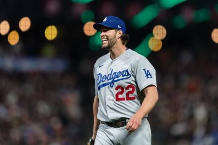 Apr 12, 2023; San Francisco, California, USA;  Los Angeles Dodgers starting pitcher Clayton Kershaw (22) reacts after walking a San Francisco Giants batter during the fifth inning at Oracle Park. Mandatory Credit: John Hefti-USA TODAY Sports