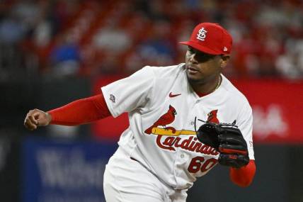 May 2, 2023; St. Louis, Missouri, USA;  St. Louis Cardinals relief pitcher Guillermo Zuniga (60) pitches in his MLB debut against the Los Angeles Angels during the ninth inning at Busch Stadium. Mandatory Credit: Jeff Curry-USA TODAY Sports