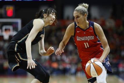 May 19, 2023; Washington, District of Columbia, USA; Washington Mystics forward Elena Delle Donne (11) drives to the basket as New York Liberty center Han Xu (21) defends in the fourth quarter at Entertainment & Sports Arena. Mandatory Credit: Geoff Burke-USA TODAY Sports