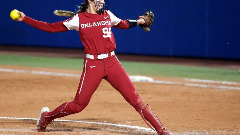 Oklahoma's Jordy Bahl (98) throws a pitch in the seventh inning during the second game of the Women's College World Championship Series between the Oklahoma Sooners and Florida State at USA Softball Hall of Fame Stadium in Oklahoma City, Thursday, June, 8, 2023.