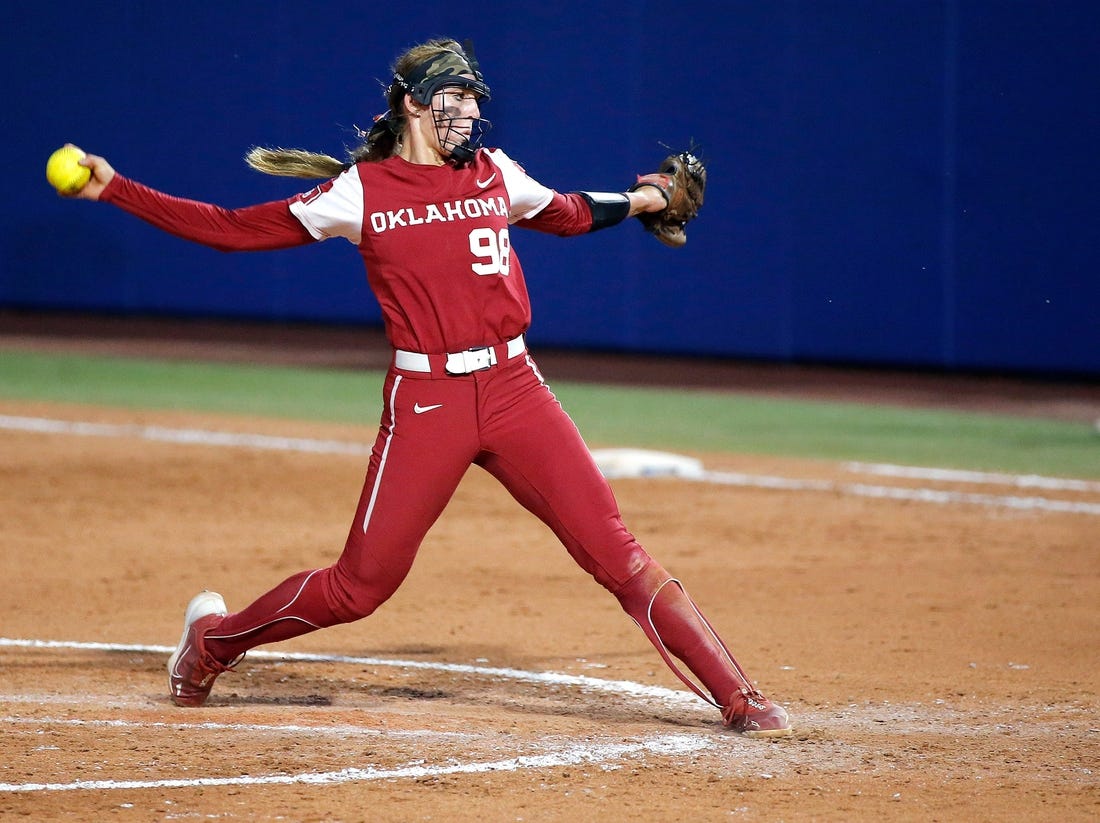 Oklahoma's Jordy Bahl (98) throws a pitch in the seventh inning during the second game of the Women's College World Championship Series between the Oklahoma Sooners and Florida State at USA Softball Hall of Fame Stadium in Oklahoma City, Thursday, June, 8, 2023.