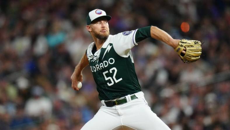 Jul 1, 2023; Denver, Colorado, USA; Colorado Rockies relief pitcher Daniel Bard (52) delivers a pitch in the ninth inning against the Detroit Tigers at Coors Field. Mandatory Credit: Ron Chenoy-USA TODAY Sports