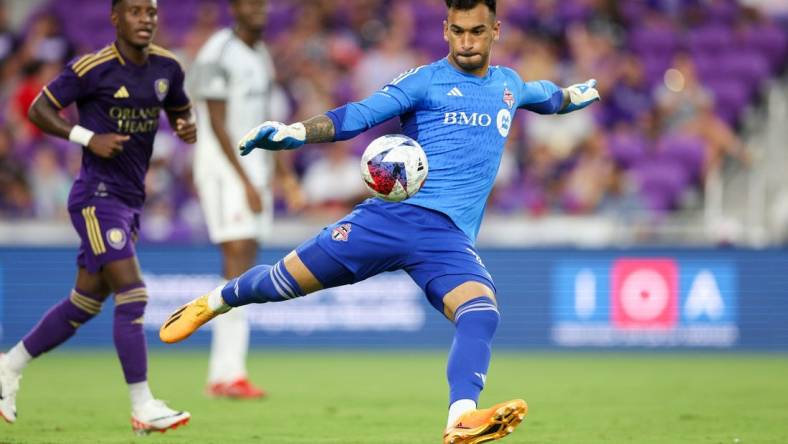 Jul 4, 2023; Orlando, Florida, USA;  Toronto FC goalkeeper Greg Ranjitsingh (18) puts the ball in play against Orlando City SC in the first half at Exploria Stadium. Mandatory Credit: Nathan Ray Seebeck-USA TODAY Sports