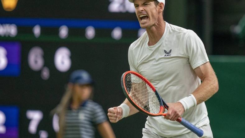 Jul 6, 2023; London, United Kingdom; Andy Murray (GBR) reacts to a point during his match against Stefanos Tsitsipas (GRE) on day four at the All England Lawn Tennis and Croquet Club.  Mandatory Credit: Susan Mullane-USA TODAY Sports