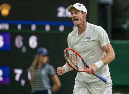 Jul 6, 2023; London, United Kingdom; Andy Murray (GBR) reacts to a point during his match against Stefanos Tsitsipas (GRE) on day four at the All England Lawn Tennis and Croquet Club.  Mandatory Credit: Susan Mullane-USA TODAY Sports