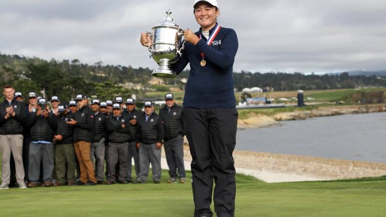 Jul 9, 2023; Pebble Beach, California, USA; Allisen Corpuz celebrates with the Harton S. Semple Trophy after winning the U.S. Women's Open golf tournament at Pebble Beach Golf Link. Mandatory Credit: Kiyoshi Mio-USA TODAY Sports