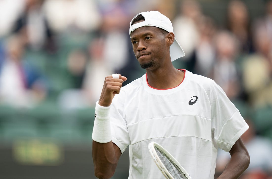 Jul 12, 2023; London, United Kingdom; Christopher Eubanks (USA) reacts to a point during his match against Daniil Medvedev on day ten of Wimbledon at the All England Lawn Tennis and Croquet Club.  Mandatory Credit: Susan Mullane-USA TODAY Sports