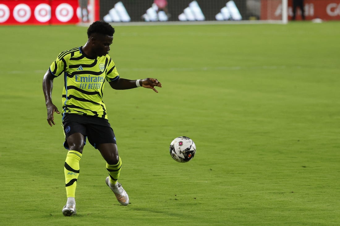 Jul 19, 2023; Washington, DC, USA; Arsenal midfielder Bukayo Saka (7) dribbles the ball against MLS All-Stars in the 2023 MLS All Star Game at Audi Field. Mandatory Credit: Geoff Burke-USA TODAY Sports