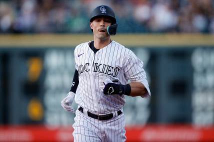 Jul 28, 2023; Denver, Colorado, USA; Colorado Rockies right fielder Randal Grichuk (15) rounds the bases on a solo home run in the fourth inning against the Oakland Athletics at Coors Field. Mandatory Credit: Isaiah J. Downing-USA TODAY Sports