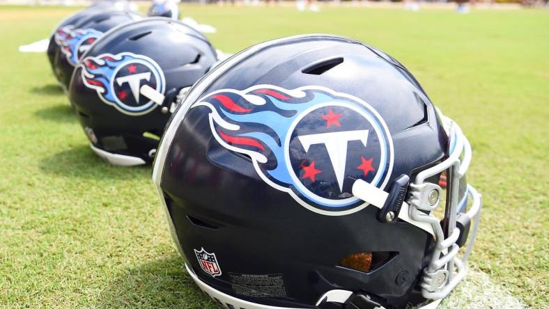 Jul 29, 2023; Nashville, TN, USA; View of helmets on the field as Tennessee Titans players finish training camp practice. Mandatory Credit: Christopher Hanewinckel-USA TODAY Sports