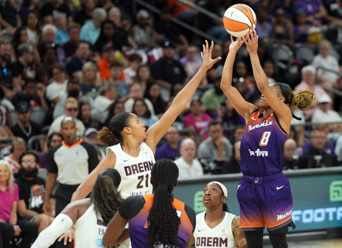 Aug 3, 2023; Phoenix, Arizona, USA; Atlanta Dream center Iliana Rupert (21) defends against Phoenix Mercury guard Moriah Jefferson (8) during the game at at Footprint Center. Mandatory Credit: Joe Camporeale-USA TODAY Sports