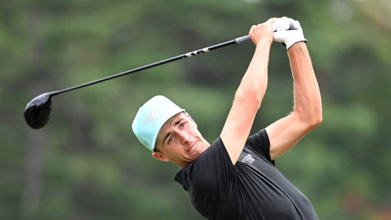 Aug 6, 2023; White Sulphur Springs, West Virginia, USA; David Puig tees off on the 11th hole during the final round of the LIV Golf event at The Old White Course. Mandatory Credit: Bob Donnan-USA TODAY Sports