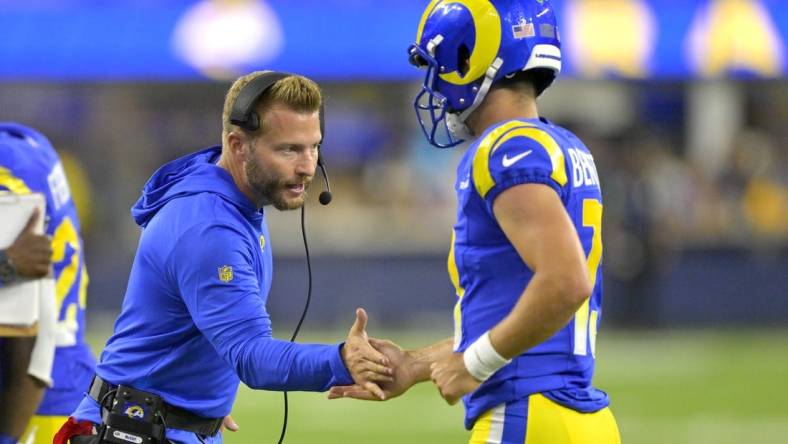 Aug 12, 2023; Inglewood, California, USA;   Los Angeles Rams coach Sean McVay congratulates quarterback Stetson Bennett (13) after a touchdown in the second half against the Los Angeles Chargers at SoFi Stadium. Mandatory Credit: Jayne Kamin-Oncea-USA TODAY Sports