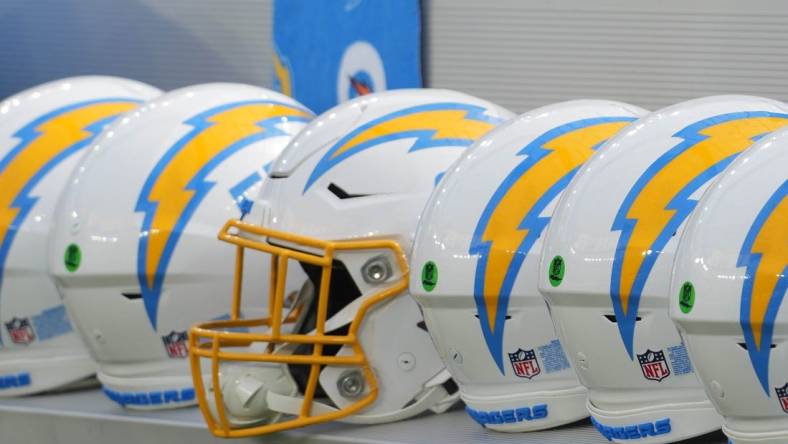 Aug 12, 2023; Inglewood, California, USA; Los Angeles Chargers helmets on the bench at SoFi Stadium. Mandatory Credit: Kirby Lee-USA TODAY Sports