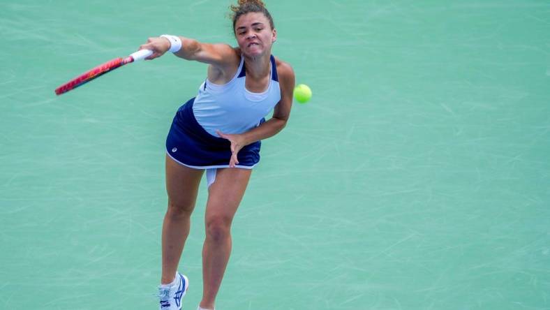 Jasmine Paolini of Italy makes a hit to Coco Gauff of the U.S. during the quarterfinals of the Western & Southern Open at the Lindner Family Tennis Center in Mason Friday, August, 18, 2023