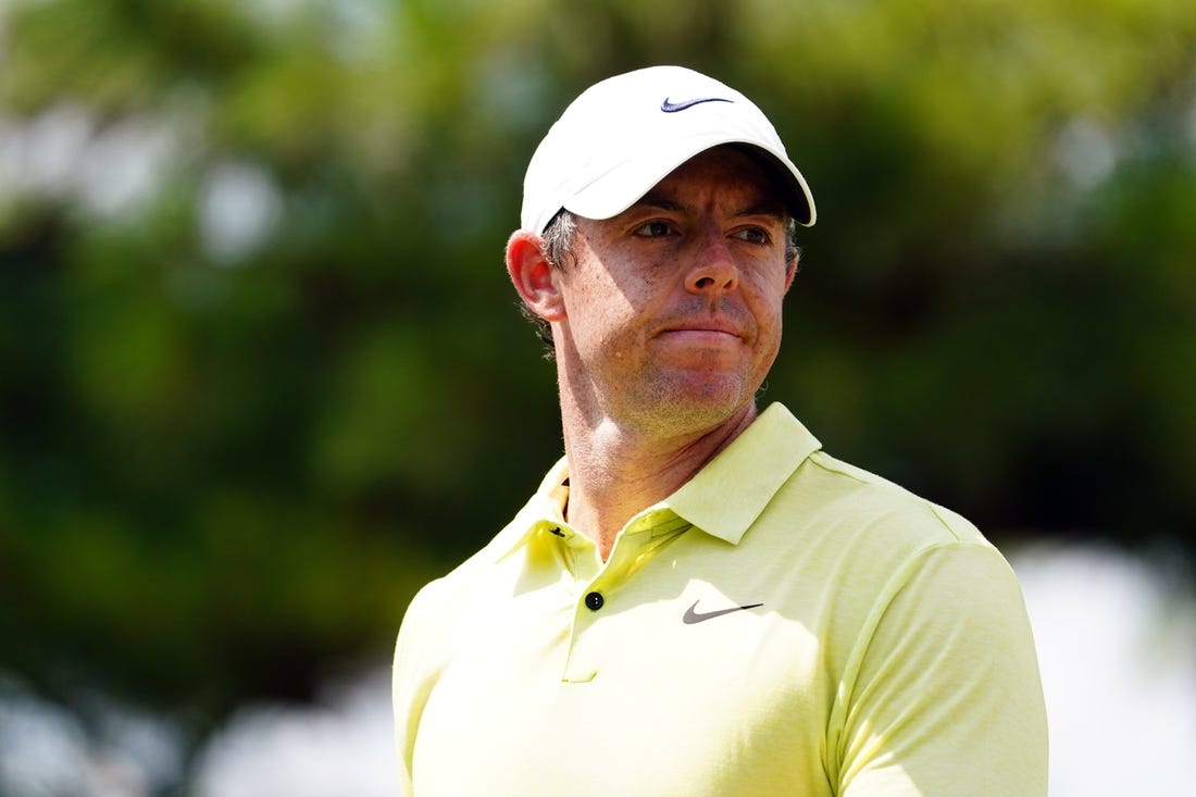 Aug 26, 2023; Atlanta, Georgia, USA; Rory McIlroy reacts to his putt on the third green during the third round of the TOUR Championship golf tournament at East Lake Golf Club. Mandatory Credit: John David Mercer-USA TODAY Sports