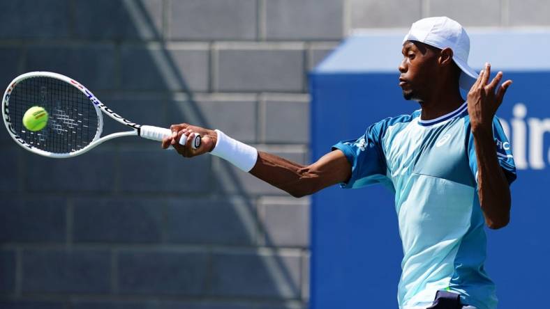 Aug 30, 2023; Flushing, NY, USA; Christopher Eubanks of the United States hits a shot against Benjamin Bonzi of France on day three of the 2023 U.S. Open tennis tournament at the USTA Billie Jean King National Tennis Center. Mandatory Credit: Jerry Lai-USA TODAY Sports