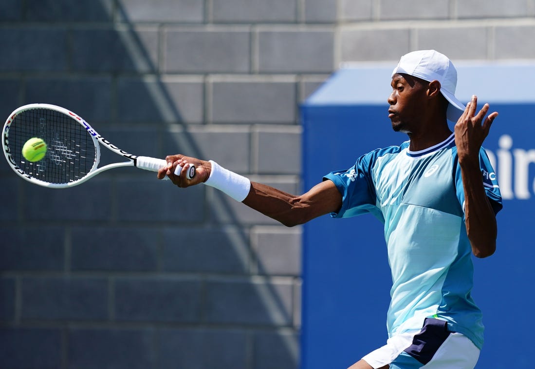 Aug 30, 2023; Flushing, NY, USA; Christopher Eubanks of the United States hits a shot against Benjamin Bonzi of France on day three of the 2023 U.S. Open tennis tournament at the USTA Billie Jean King National Tennis Center. Mandatory Credit: Jerry Lai-USA TODAY Sports
