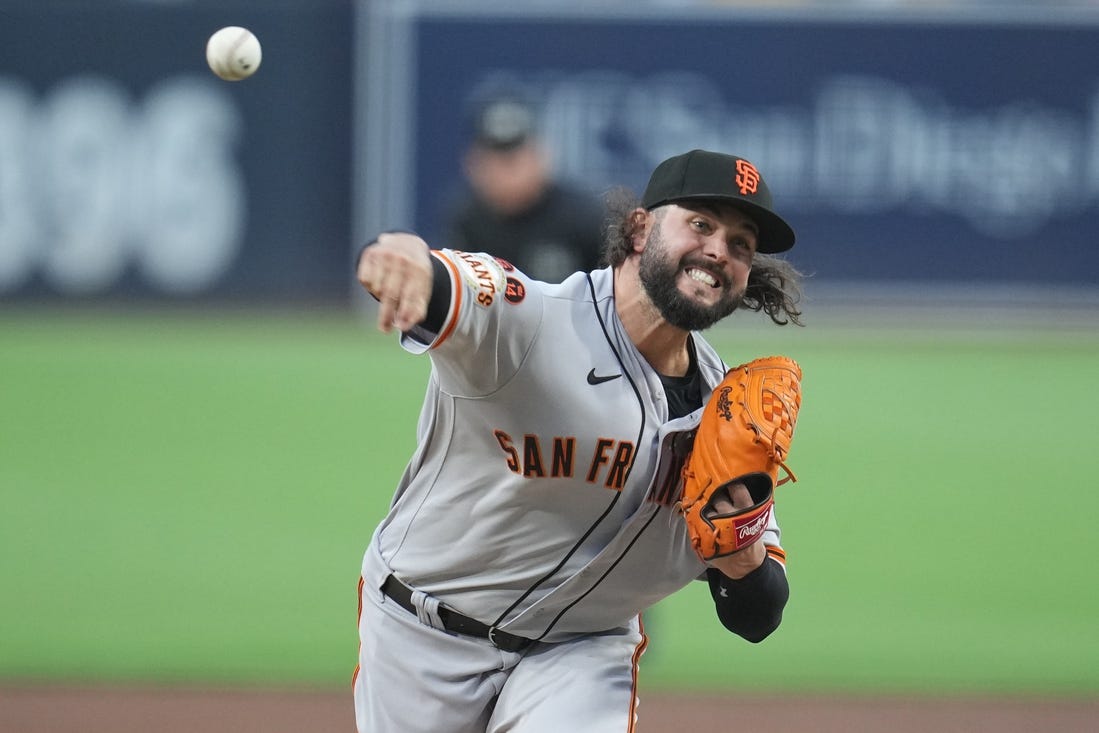 Aug 31, 2023; San Diego, California, USA;  San Francisco Giants starting pitcher Jakob Junis (34) throws a pitch against the San Diego Padres during the first inning at Petco Park. Mandatory Credit: Ray Acevedo-USA TODAY Sports