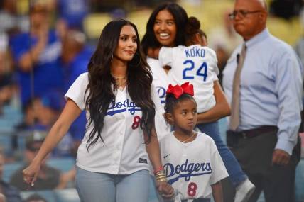 September 1, 2023; Los Angeles, California, USA; Vanessa Bryant, wife of former Los Angeles Lakers player Kobe Bryant in attendance with daughters Natalia, Bianka and Capri in attendance at Dodger Stadium. Mandatory Credit: Gary A. Vasquez-USA TODAY Sports