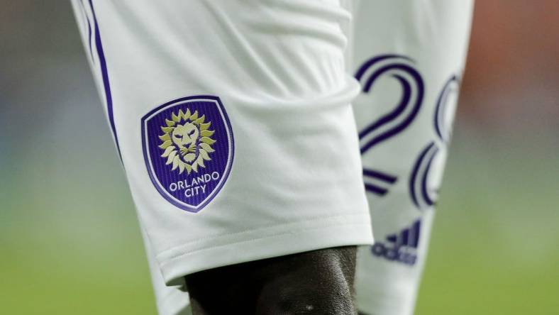 Sep 2, 2023; Cincinnati, Ohio, USA; The Orlando City SC logo on the uniform of defender Abdi Salim (28) during the second half in the game against FC Cincinnati at TQL Stadium. Mandatory Credit: Katie Stratman-USA TODAY Sports