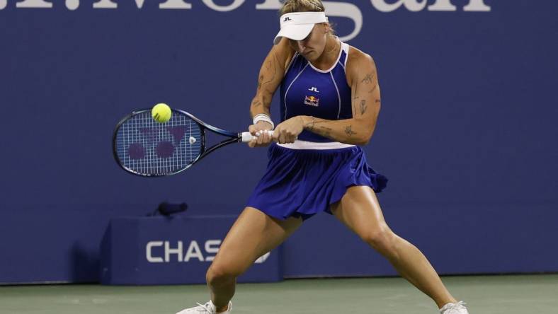 Sep 2, 2023; Flushing, NY, USA; Marketa Vondrusova of Czech Republic hits a backhand against Ekaterina Alexandrova (not pictured) on day six of the 2023 U.S. Open tennis tournament at USTA Billie Jean King National Tennis Center. Mandatory Credit: Geoff Burke-USA TODAY Sports