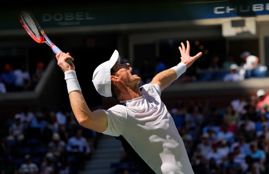 Aug 31, 2023; Flushing, NY, USA; Andy Murray hits to Grigor Dimitrov on day four of the 2023 U.S. Open tennis tournament at USTA Billie Jean King National Tennis Center. Mandatory Credit: Robert Deutsch-USA TODAY Sports