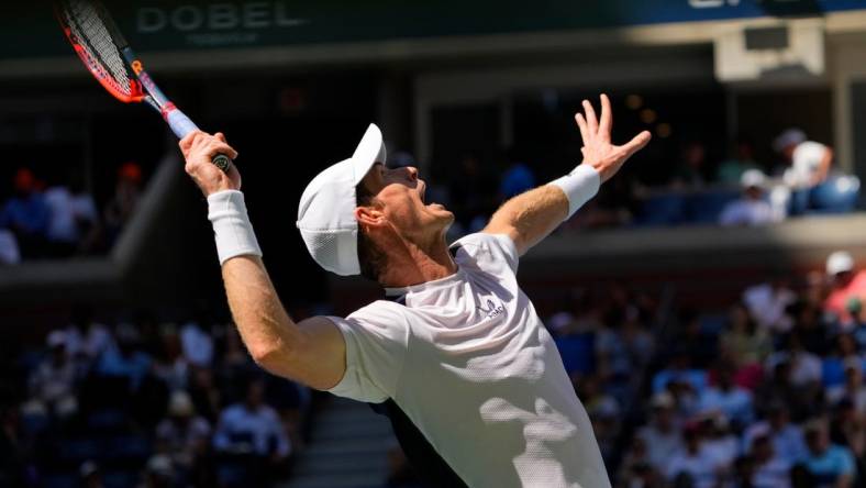 Aug 31, 2023; Flushing, NY, USA; Andy Murray hits to Grigor Dimitrov on day four of the 2023 U.S. Open tennis tournament at USTA Billie Jean King National Tennis Center. Mandatory Credit: Robert Deutsch-USA TODAY Sports