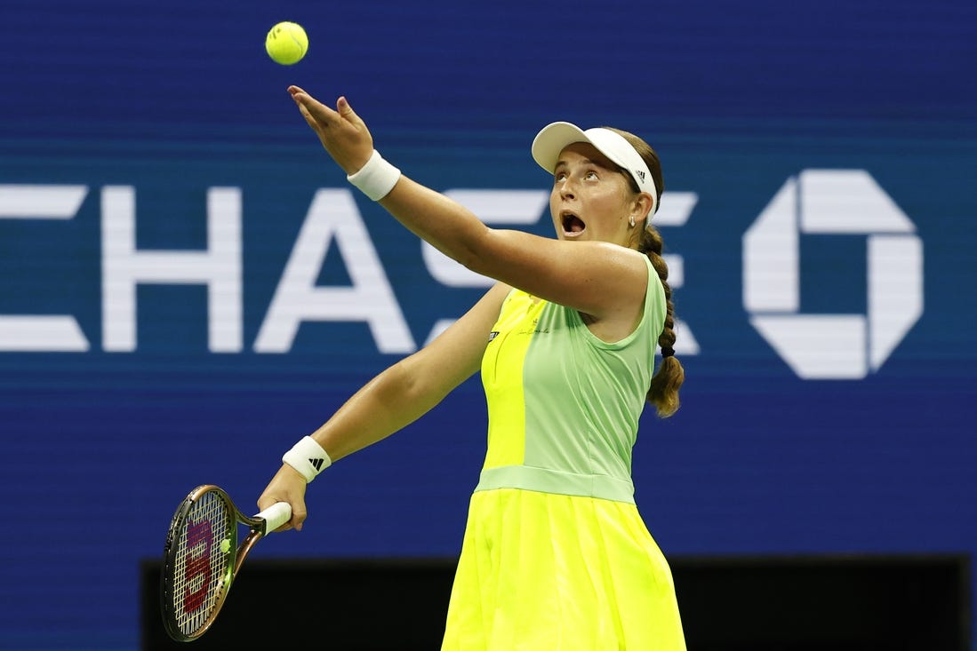 Sep 3, 2023; Flushing, NY, USA; Jelena Ostapenko of Latvia serves against Iga Swiatek of Poland (not pictured) on day seven of the 2023 U.S. Open tennis tournament at USTA Billie Jean King National Tennis Center. Mandatory Credit: Geoff Burke-USA TODAY Sports