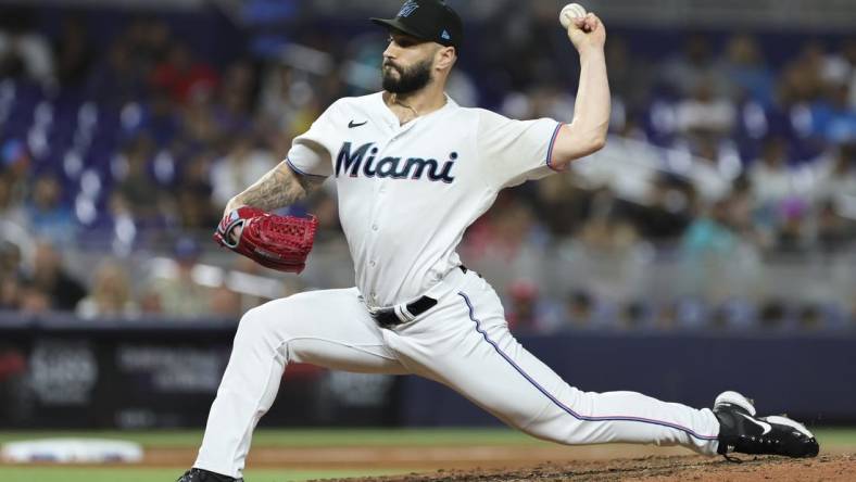 Sep 5, 2023; Miami, Florida, USA; Miami Marlins relief pitcher Tanner Scott (66) delivers a pitch against the Los Angeles Dodgers during the ninth inning at loanDepot Park. Mandatory Credit: Sam Navarro-USA TODAY Sports