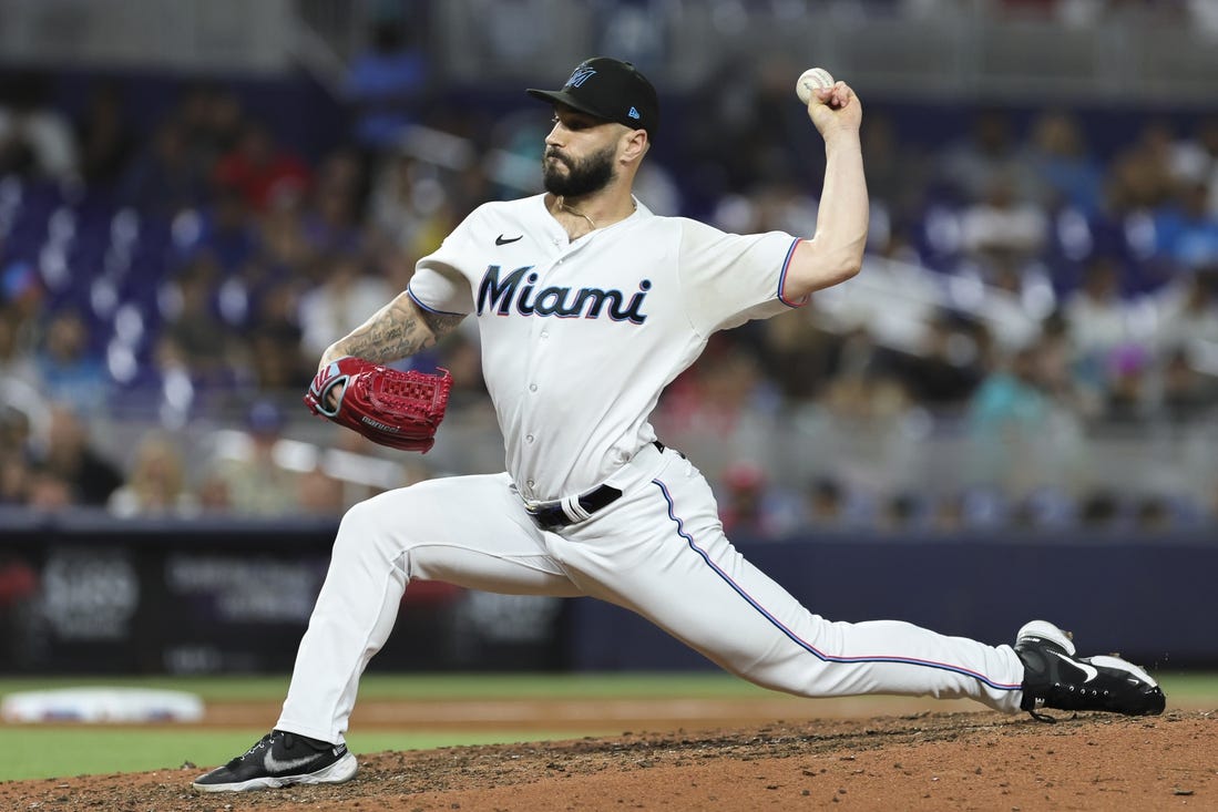 Sep 5, 2023; Miami, Florida, USA; Miami Marlins relief pitcher Tanner Scott (66) delivers a pitch against the Los Angeles Dodgers during the ninth inning at loanDepot Park. Mandatory Credit: Sam Navarro-USA TODAY Sports
