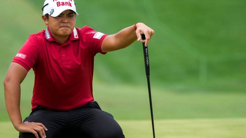 Peiyun Chien, of Pingtung, Chinese Taipei, reads her putt on the 18th hole at the 2023 Kroger Queen City Championship presented by P&G at Kenwood Country Club in Madeira, Ohio, on Saturday, Sept. 9, 2023. Chien finished 13 under.