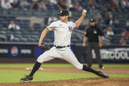 Sep 9, 2023; Bronx, New York, USA;  New York Yankees relief pitcher Matt Krook (92) pitches in the ninth inning against the Milwaukee Brewers at Yankee Stadium. Mandatory Credit: Wendell Cruz-USA TODAY Sports