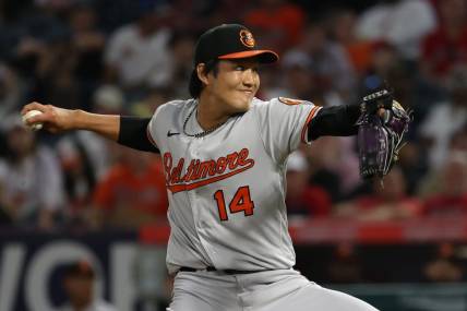 Sep 6, 2023; Anaheim, California, USA;  Baltimore Orioles relief pitcher Shintaro Fujinami (14) pitches during the eighth inning against the Los Angeles Angels at Angel Stadium. Mandatory Credit: Kiyoshi Mio-USA TODAY Sports