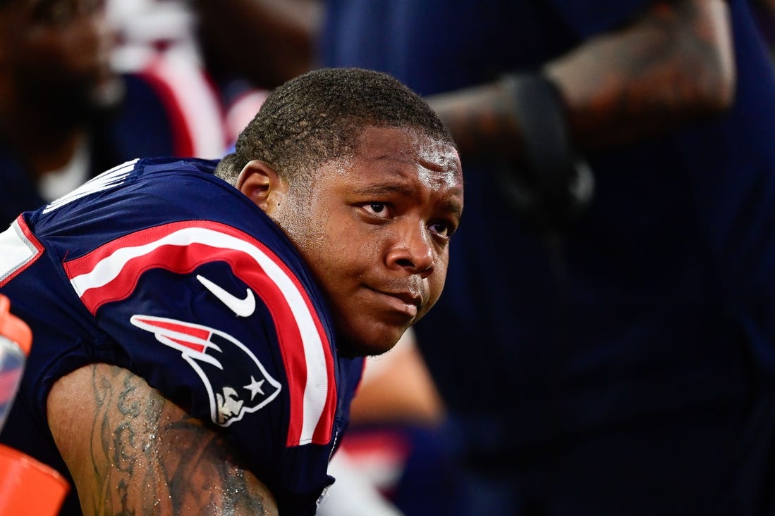 Sep 10, 2023; Foxborough, Massachusetts, USA; New England Patriots offensive tackle Trent Brown (77) sits on the bench during the second half against the Philadelphia Eagles at Gillette Stadium. Mandatory Credit: Eric Canha-USA TODAY Sports