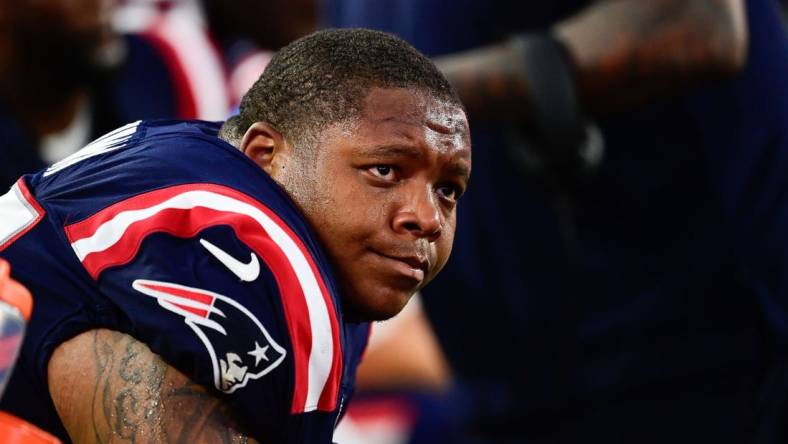 Sep 10, 2023; Foxborough, Massachusetts, USA; New England Patriots offensive tackle Trent Brown (77) sits on the bench during the second half against the Philadelphia Eagles at Gillette Stadium. Mandatory Credit: Eric Canha-USA TODAY Sports