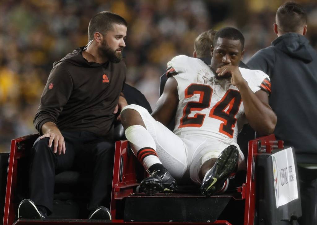 Sep 18, 2023; Pittsburgh, Pennsylvania, USA;  Cleveland Browns running back Nick Chubb (24) is taken from the field on a cart after suffering an apparent injury against the Pittsburgh Steelers during the second quarter at Acrisure Stadium. Mandatory Credit: Charles LeClaire-USA TODAY Sports