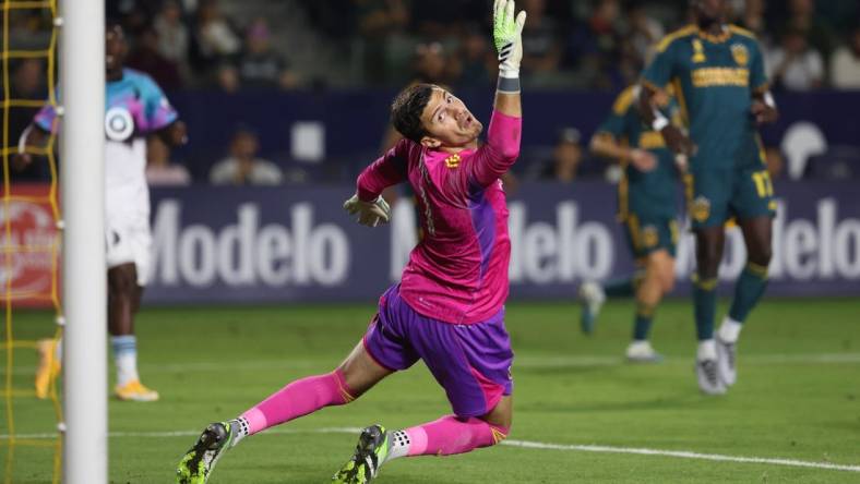 Sep 20, 2023; Carson, California, USA;  Los Angeles Galaxy goalkeeper Jonathan Bond (1) misses a save during the first half against Minnesota United FC at Dignity Health Sports Park. Mandatory Credit: Kiyoshi Mio-USA TODAY Sports