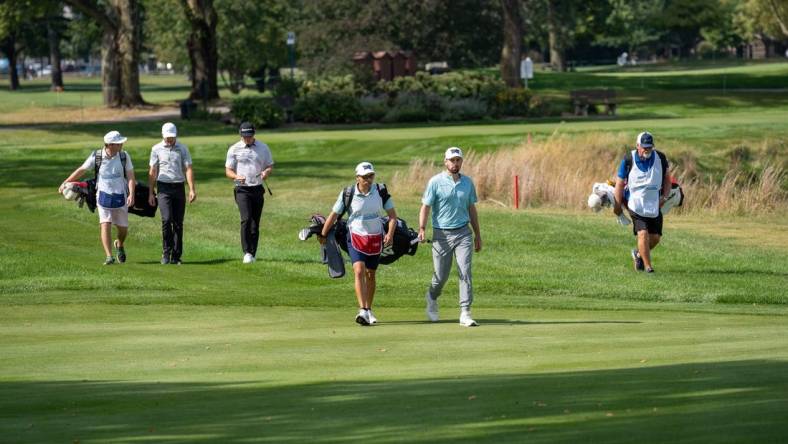 Sep 21, 2023; Columbus, OH, USA;
The group consisting of Cristobal Del Solar, Frankie Carman III and Trent Phillips walks the fairway to their balls on hole 8 during the Nationwide Children   s Hospital Championship.