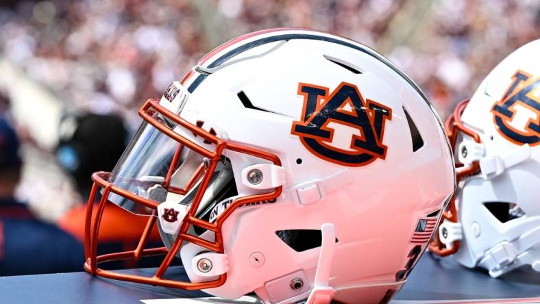 Sep 23, 2023; College Station, Texas, USA; A detailed view of an Auburn Tigers helmet on the sideline of the game against the Texas A&M Aggies at Kyle Field. Mandatory Credit: Maria Lysaker-USA TODAY Sports