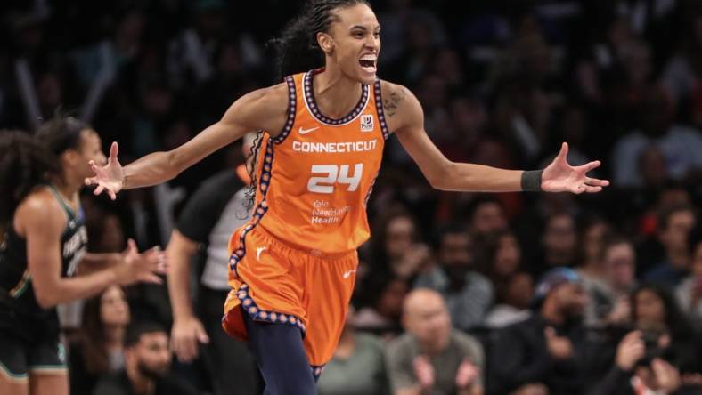 Sep 24, 2023; Brooklyn, New York, USA; Connecticut Sun forward DeWanna Bonner (24) celebrates after scoring in the fourth quarter against the New York Liberty during game one of the 2023 WNBA Playoffs at Barclays Center. Mandatory Credit: Wendell Cruz-USA TODAY Sports