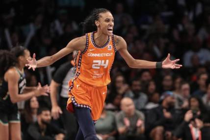Sep 24, 2023; Brooklyn, New York, USA; Connecticut Sun forward DeWanna Bonner (24) celebrates after scoring in the fourth quarter against the New York Liberty during game one of the 2023 WNBA Playoffs at Barclays Center. Mandatory Credit: Wendell Cruz-USA TODAY Sports