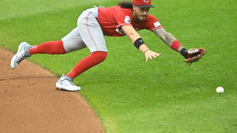 Sep 26, 2023; Cleveland, Ohio, USA; Cincinnati Reds second baseman Jonathan India (6) dives for the ball on a base hit by the Cleveland Guardians in the second inning at Progressive Field. Mandatory Credit: David Richard-USA TODAY Sports