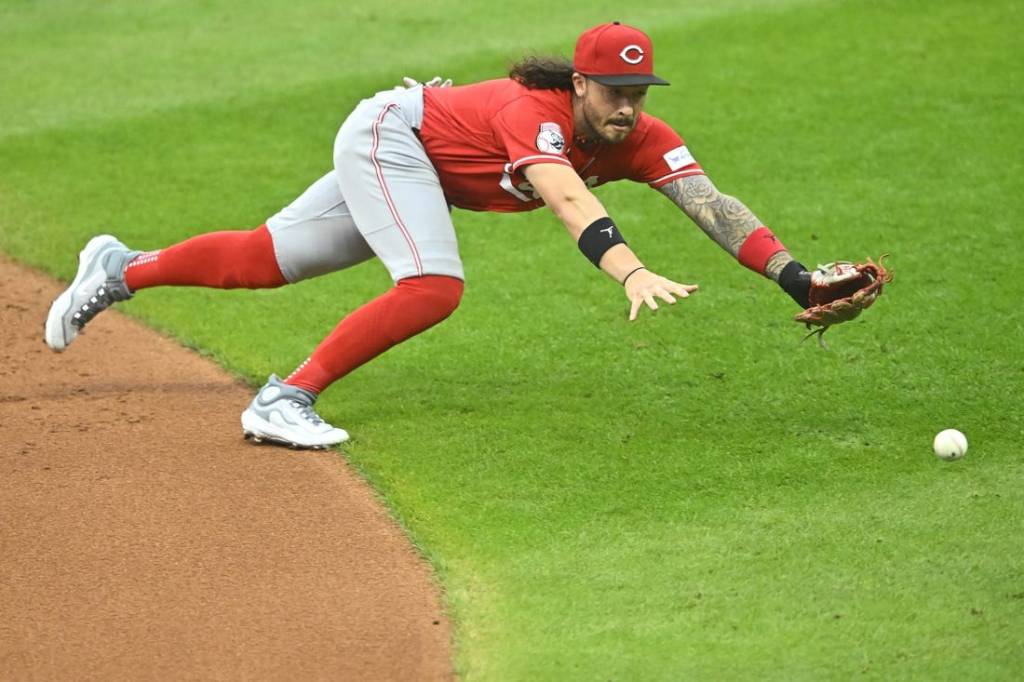 Sep 26, 2023; Cleveland, Ohio, USA; Cincinnati Reds second baseman Jonathan India (6) dives for the ball on a base hit by the Cleveland Guardians in the second inning at Progressive Field. Mandatory Credit: David Richard-USA TODAY Sports