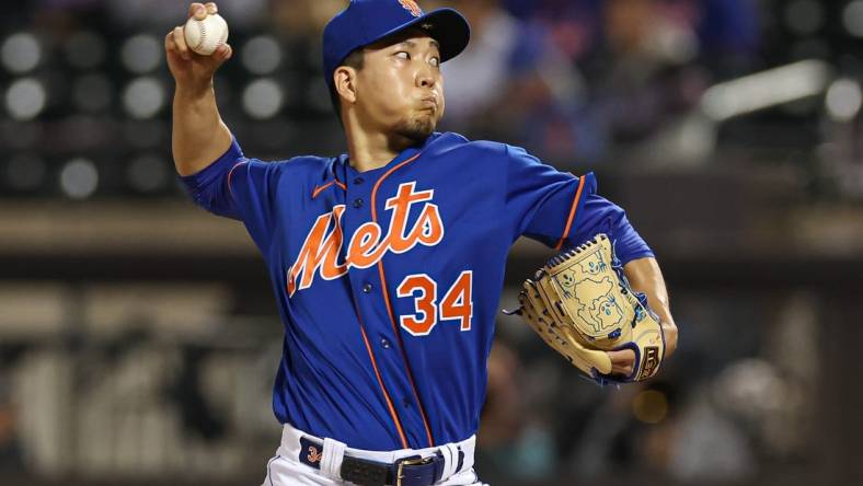 Sep 27, 2023; New York, NY, USA; New York Mets starting pitcher Kodai Senga (34) delivers a pitch during the first inning against the Miami Marlins at Citi Field.  Mandatory Credit: Vincent Carchietta-USA TODAY Sports